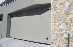 Sectional roof garage doors